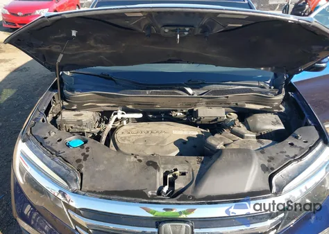 2016 Honda Pilot Touring z USA, uszkodzony, nr VIN 5FNYF5H90GB010900